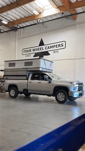 Four Wheel Pop-Up Truck Campers on Instagram: "We had to keep Stan from running away with this one 🏃💨 8ft Project M on a beautiful Chevy 2500. Love the grey on grey combo with black accents. #popuptruckcamper #truckcamper #projectm"