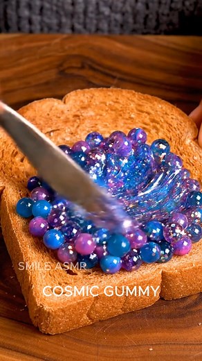 1.9K views · 12 reactions | II ASMR II Spreading COSMIC GUMMY & COLOR-MORPH onto toast Comment your favorite! I ASMR Compilation #asmr #smileasmr #ai #foodasmr | SMILE ASMR | Facebook