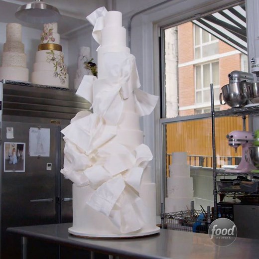 1.2M views · 6.5K reactions | When the wedding cake is a whopping 7 feet tall, it just might out-shine the newlyweds!  (via Madison Lee's Cakes) #RidiculousCakes > Mondays at 10|9c | Food Network | Facebook