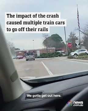 Train derails after crashing into truck