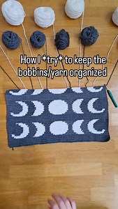 It doesn't matter if it's a small (like a coaster) or big project (like a blanket), when I'm working with multiple bobbins or strands of yarn I arrange them as I'm using them (RS facing) & then always, always turn back & forth (as in left, right, left, right) & not in a circle as I work the rows back & forth. Does that make sense? As you can see here when I was making Moon Phase Wall Hanging I used many bobbins of color & while that looks intimidating, as long as they stay put it wasn't that bad