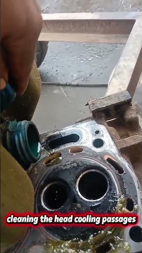 Cleaning the engine cylinder head cooling passages to remove rust. 🔧#caterpillar #mechanic