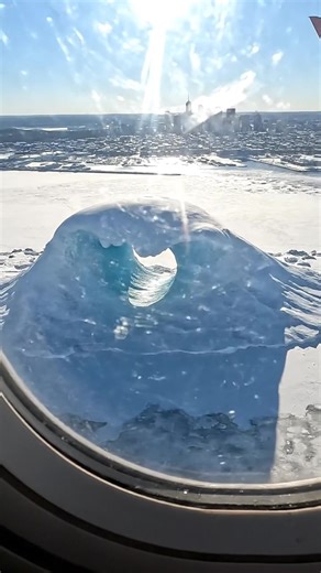 In the icy sea, a massive wave has frozen into a perfect loop — rising from the water, curving around, and reconnecting with itself. Completely still, impossible, and breathtaking, the wave hovers over the frozen coastline like a giant icy ring suspended in time. ⚠️ This post is created using artificial intelligence and does not show real events or real-world data. #FrozenWave #FullLoopWave #SnowyCoast #WinterSea #GiantWave #UnrealNature #fblifestyle #Earthimpacts #OceanWonder #WinterWaves | Ear