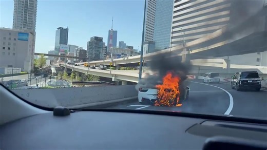 Shock moment new £220k Ferrari bursts into flames AN HOUR after driver bought it