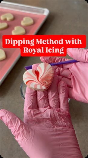 Christian McDonald on Instagram: "The quickest way to get icing on the cookies… dipping! This fun marbled texture is easy to create and you can crank out a lot of cookies very quickly! You need a thin 10 second icing for this method. #cookiedecorating #cookiesofinstagram #decoratedcookies #royalicing #royalicingcookies"