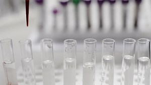 Download Scientist testing in laboratory. for free