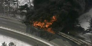 A tanker truck carrying 9,000 gallons of fuel just burst into flames
