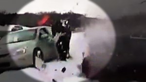 Car crashes into police officer