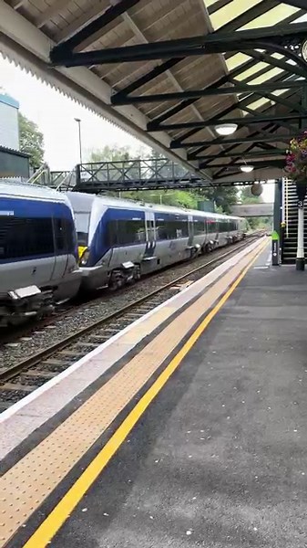 TRANSLINK TRAIN departing LISBURN TRAIN STATION in NORTHERN IRELAND