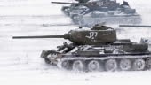 Legendary Russian Tanks T34 attack an enemy position. Video taken...