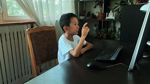 boy learning computer programming