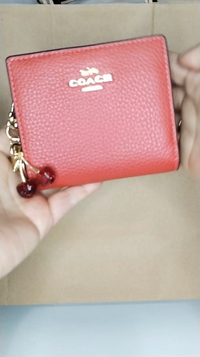 Coach Snap Wallet: Estilo y Funcionalidad