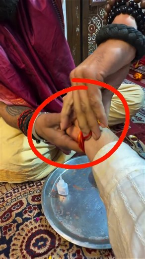 Miracle sacred thread tied on the wrist #shortsvideo