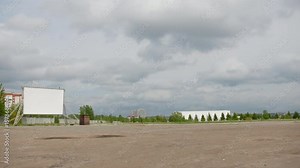 Time lapse with empty screen of open car cinema - billboard