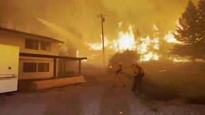 Firefighters battle wildfire on Gold Ranch Rd, Nevada