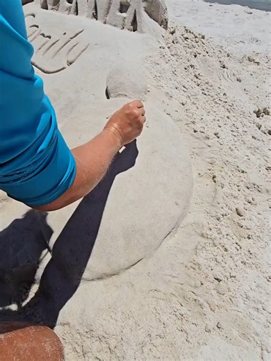 Turtle Sighting at the Beach: A Sand Sculpture Journey