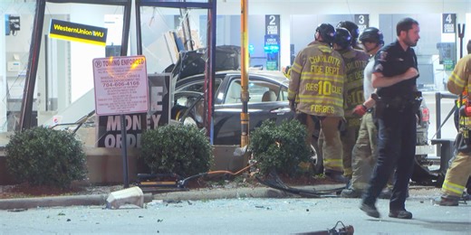 PHOTOS: 2 hurt after car slams into Charlotte check-cashing building