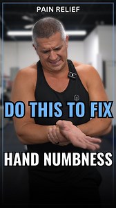 Are you like a lot of my patients, and you’re getting hand numbness either during the day or while you’re sleeping? It’s usually pretty easy to get rid of. Stick around, and let me show you. Think of it like my finger through my watchband. There’s a nerve in your wrist here called the median nerve. If it gets trapped underneath the structures, it can make your hand numb. A simple way to address that is to spread your fingers out, push the palm of your hand into a stable structure, and lean back 
