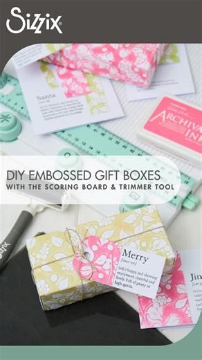 Sizzix on Instagram: "Your A5 Embossing Folders are about to become your favorite holiday gift-wrapping tool. Watch Pete Hughes transform the Snowberry A5 Embossing Folder (666506) into bespoke festive gift boxes using ink, the Effectz Multi-Tool brayer, and the Sizzix Scoring Board & Trimmer Tool. Pete inks the smooth side of the folder, embosses to reveal that gorgeous ink-transferred texture, then scores and trims the panel into a perfectly sized box lid. Add it to a plain box base and your h