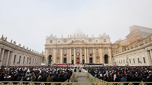 Pope Benedict's coffin being carried out of St Peter's Basilica and placed before the altar