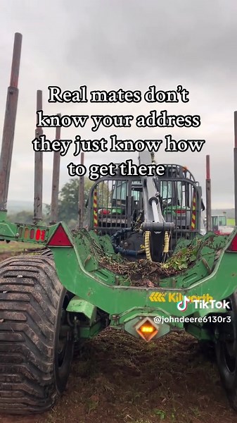 John Deere 6130R Log Handling in Action