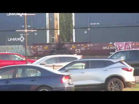 (9-27-2025) Train meet in Fostoria Ohio:CSX WB and EB freight trains.