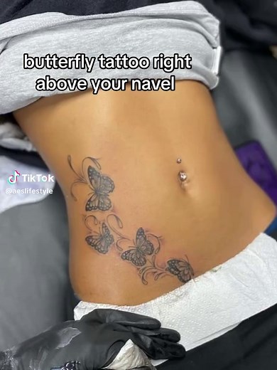 Stunning Butterfly Tattoo Above Belly Button