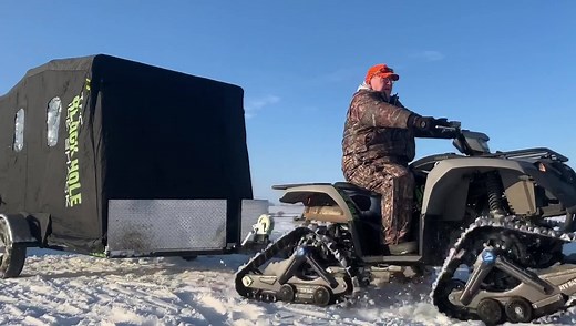 The newest innovation in ice shacks! The Black Hole Ice Shack! Hybrid trailer/portable. Get on the ice earlier and stay out longer! https://theblackholeiceshack.com/ | Ridge Road Outdoors