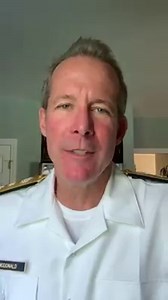 Standing at attention for an empathetic announcement from Rear Admiral McDonald. | Massachusetts Maritime Academy