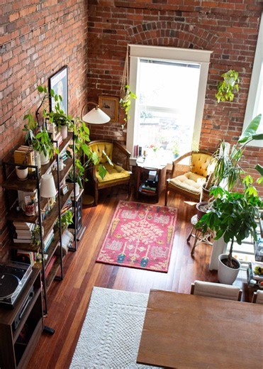 Apartment Therapy | @juliajjshields's Seattle brick loft has lots of mid century modern influences, wood, and organic shapes. See more of this home at the link... | Instagram