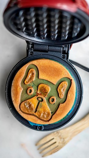 2M views · 5K reactions | Starting this week off right with Blue and Yellow Bulldog Mini Waffle! 劉 #waffles #waffle #wafflehouse #waffels #proteinwaffles #wafflicious #waffleswaffleswaffles #bulldog #waffleart #messyfun #colorfulfood #wafflemaker #miniwafflemaker #ilovewaffles #wafflelove #blueyellow | Spiced Up Mom | Facebook