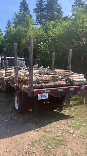 Efficient Log Unloading from Flatbed Trailer