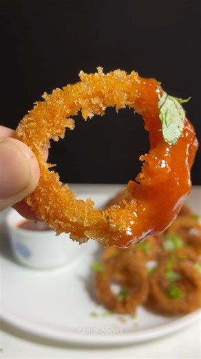 carlo cooks | asmr | food on Instagram: "Crispy Onion Rings @chingssecret “Craving a spicy twist on classic onion rings? 🍽️ Watch as I make crispy, mouth-watering onion rings using Ching’s Schezwan Ketchup! Perfectly seasoned and packed with flavor. Don’t miss this quick and easy recipe! 🔥 [ Crispy onion rings, onion rings, cooking, recipe, food , asmr , explore , explore page, viral , fyp , trendingreels ] #reels #reelsinstagram #asmr #asmrsounds #satisfying #cooking #recipe #instafood #onion