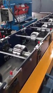 1.1K views · 25 reactions | A gutter roll forming machine is used to produce rain gutters, which are used in the rainwater goods system. Web: https://www.sunwaymachinery.com.cn/shop/gutter-roll-forming-machine | Sunway Machinery | Facebook