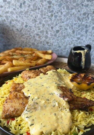 Baked Hake with Creamy Garlic & Herb Sauce