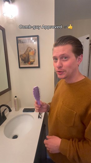 2.5K views | Comb-guy approved 类✅ Traditional combs with stiff teeth can actually cause damage & unnecessary hair loss. ​ ​ Our SMOOTHIE Brush is a flexible favorite for a reason:​ 类 Soft-flex bristles to gently smooth & detangle​ 类 Flexible spine to reduce breakage​ 类 Curved shape hugs the scalp for comfort & massage​ ​ Shop now: https://bit.ly/49q9LSk | Calista by Maria McCool | Facebook