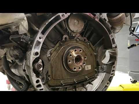 SprinterVanShop Tech works on Mercedes Sprinter 2500 Oil Leak. Rear Main Seal and Oil Cooler Repair