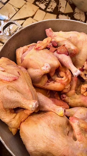 Raw Chicken Preparation Process in a Kitchen