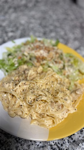Creamy Chicken Alfredo Caesar salad for the win tonight 🤌🏽🍝✨ Quick, creamy, and feeds 6–8! Ingredients: Chicken breast, butter, olive oil, garlic, heavy cream, Parmesan, fettuccine, salt, pepper, garlic/onion powder, paprika. Instructions: Season & cook chicken in butter/oil. Remove → sauté garlic → add heavy cream. Stir in Parmesan until creamy. Boil pasta & save some pasta water. Combine chicken pasta with sauce. Add pasta water if needed & serve! Save this for dinner this week! 💚✨ | Domin