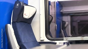 Train driving. Interior view of the passenger compartment. View from the window of a moving train.