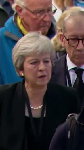 Theresa May Curtsies to Queen One Last Time