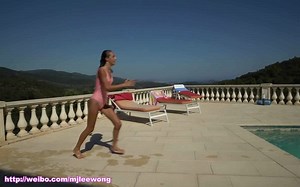 Carla swimming underwater with Hula Hoops