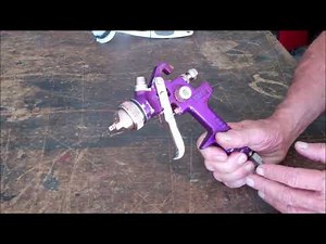 spraying Raptor bed liner on interior vinyl with HVLP gun