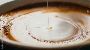 High Definition Ultra Slow Motion of Coffee Being Poured into a Cup