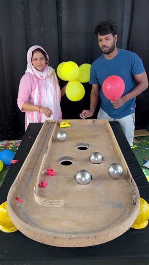 Husband vs wife next level challenge roll steel ball and pop balloon who #shorts