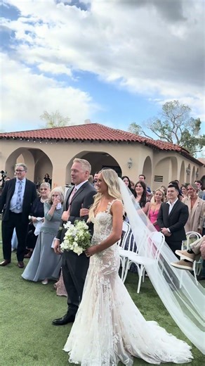 Groom surprises his bride with their dog being a part of their wedding!