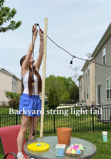 Send me all your tips and tricks 🥴🫣 @Aubrey Booth you made it look too easy 🤍🤪 #stringlightplanter #backyardstringlights #patiostringlights #smallpatioideas #stringlightsoutdoor #patiomakeover #smallpatiomakeover #planters string lights across the backyard ways to string up backyard lights how to hang backyard string lights string lights in small backyard installing backyard string lights adding string lights to backyard ideas for backyard string lights pole planters for string lights