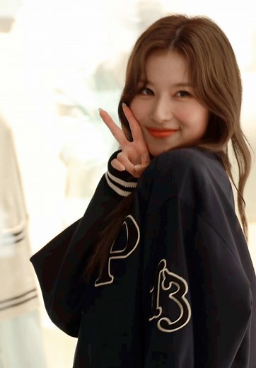 Spot the Rabbit in Sana's Shy Shy Shy Clip with Dispatch's Kpop App!