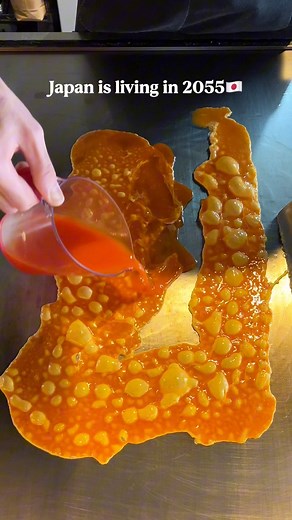 🍳This is a must-try tamagoyaki when you’re in Japan — it’s cooked on a sizzling teppan! The egg has a rich orange glow that screams ‘delicious,’ and the soft, creamy yolk is rolled right into the center, making every bite melt-in-your-mouth magic! #japanesefood #tamagoyaki #viral | Chanmyung Jeon