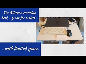 The standing desk Mittzon from Ikea is great for artists with very small space.